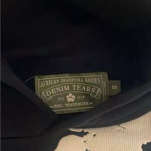 brand new “black and white denim tears” hoodie